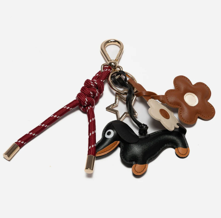 KEY CHAIN BURGUNDY WITH CHARMS - BLACK DOG AND BROWN DAISIES